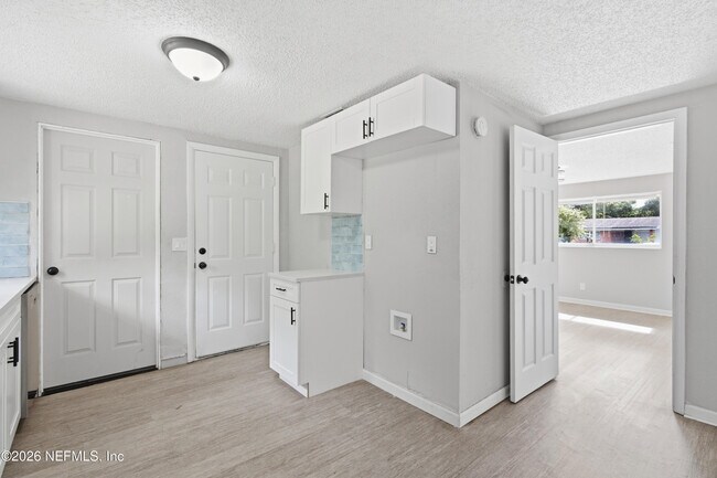 Building Photo - 7386 Dostie Dr E