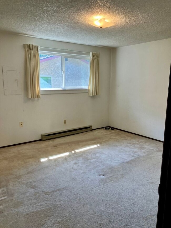 Building Photo - Spacious 2-Bed, 1.5-Bath Home with Firepla...