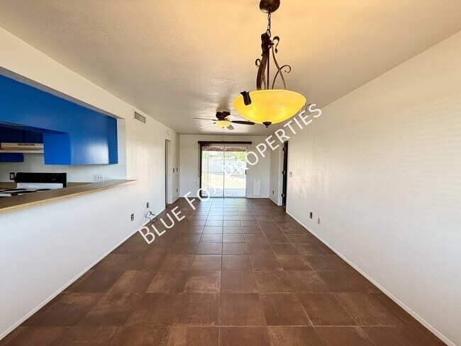 Building Photo - 7650 N Rasmussen Ave