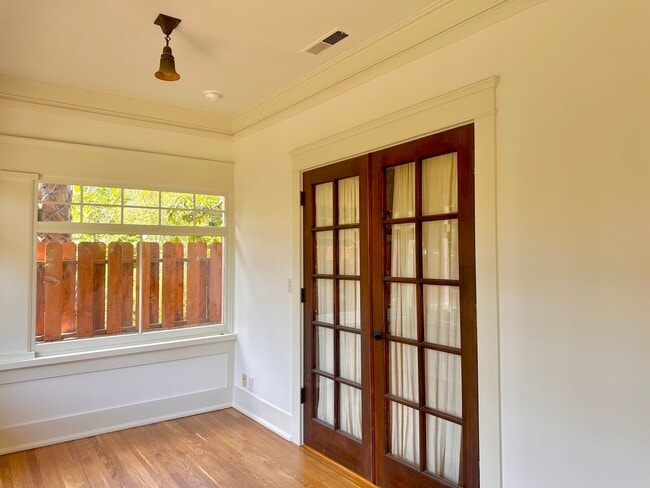 Building Photo - Meticulously Restored 1920s Craftsman on a Private, Hedged Lot | Pet Friendly!