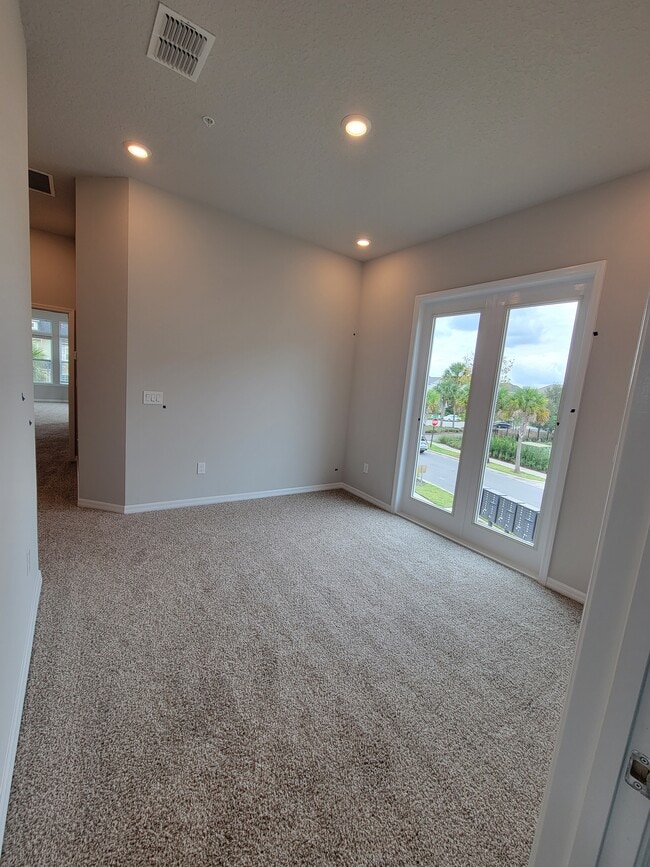 Building Photo - 8621 Tavistock Lakes Blvd