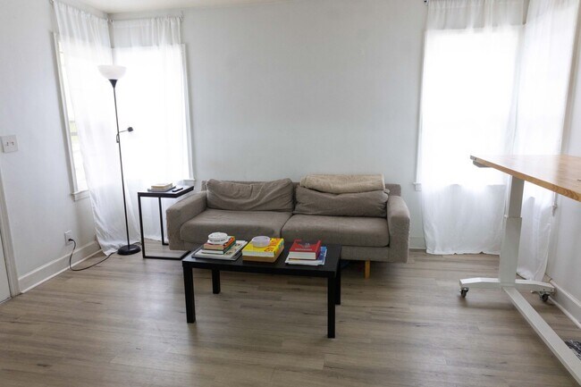 Building Photo - Charming home with a finished basement and...