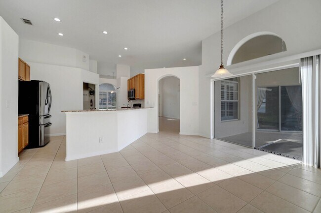 Building Photo - Stunning 4/3 with Fence Enclosed Yard in t...