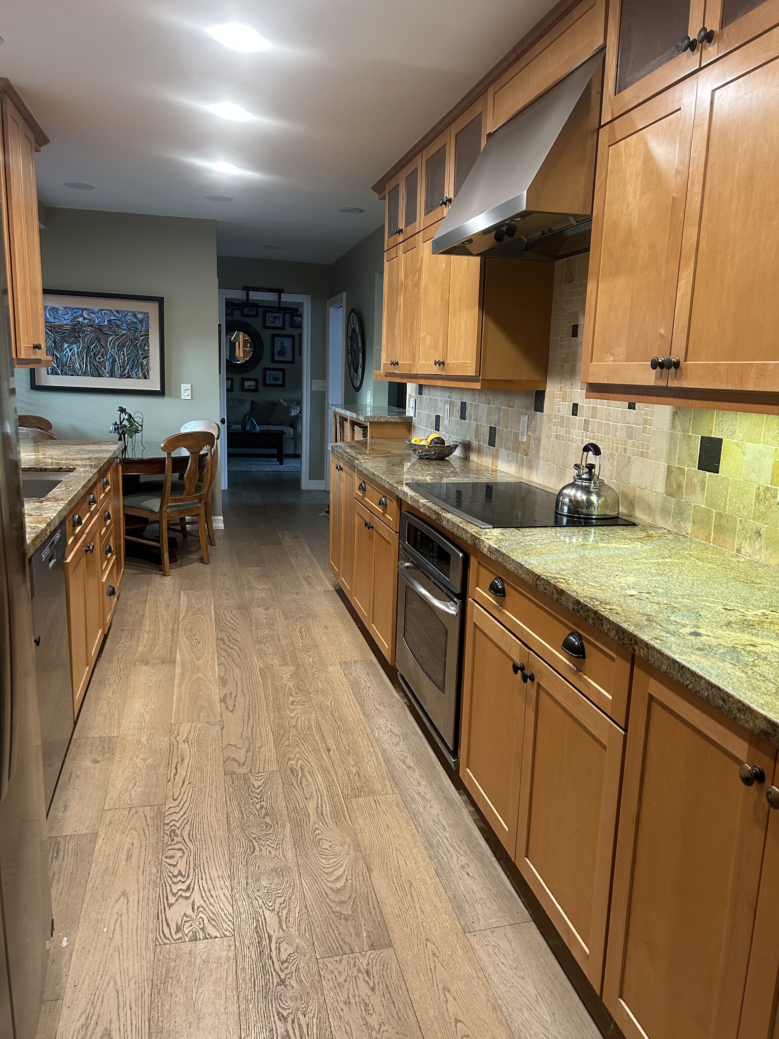 Kitchen, eating area, and glimpse at family room - 27078 Sunnyridge Rd