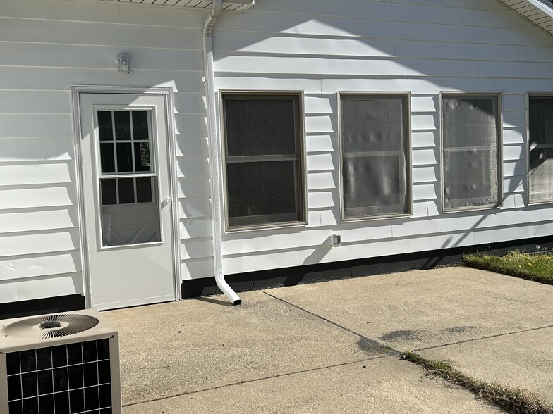 Side of Home with Cement Patio - 3383 Locust Ln