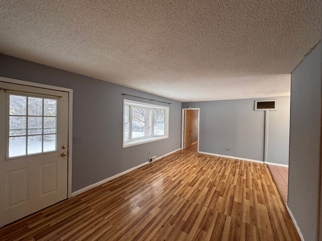 Building Photo - AVAILABLE NOW - Nicely rehabbed 3 Bedroom Single Family Home with Garage and Very Large Backyard