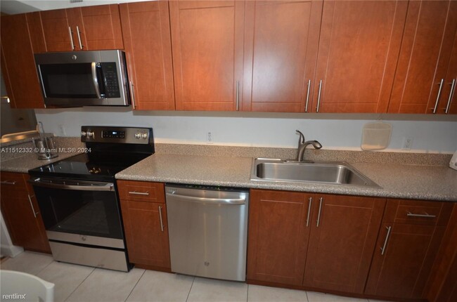 Building Photo - 2 br, 2 bath Condo - 401 69th St Apt 1013