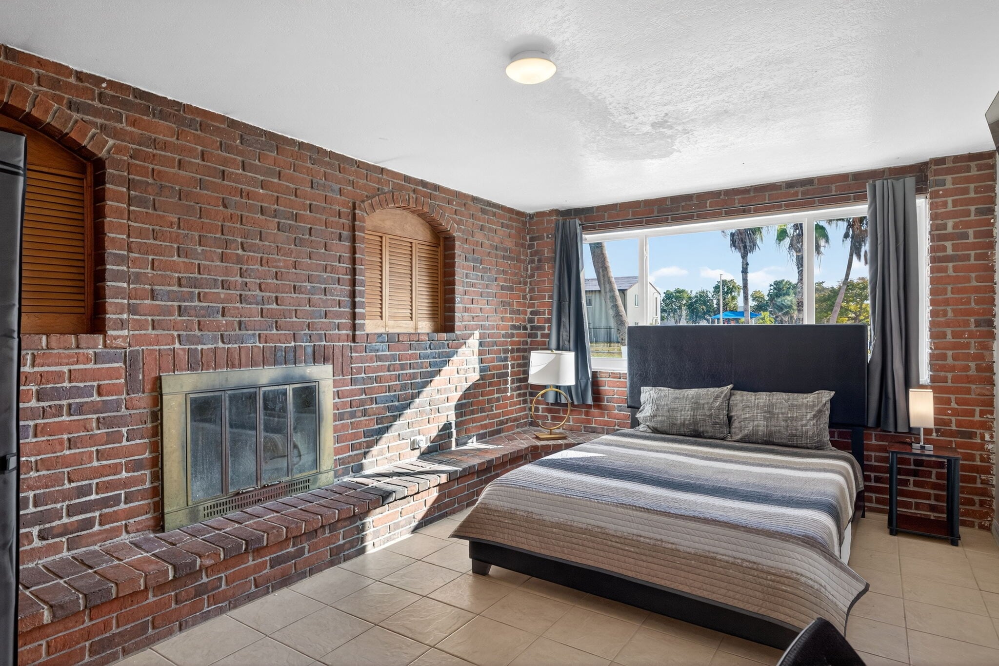 Large furnished room with wall mounted TV desk & chair - 1778 Aquarius Ct