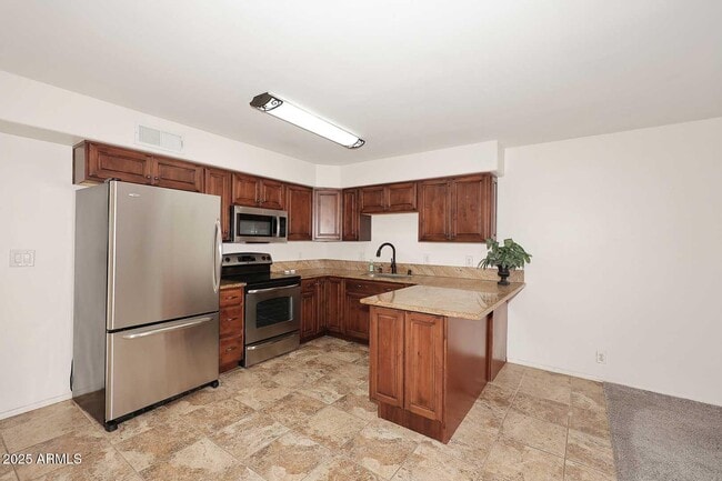 Building Photo - 7910 E Camelback Rd