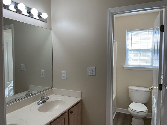 Building Photo - Spacious 4-Bedroom End-Unit Condo in Virgi...