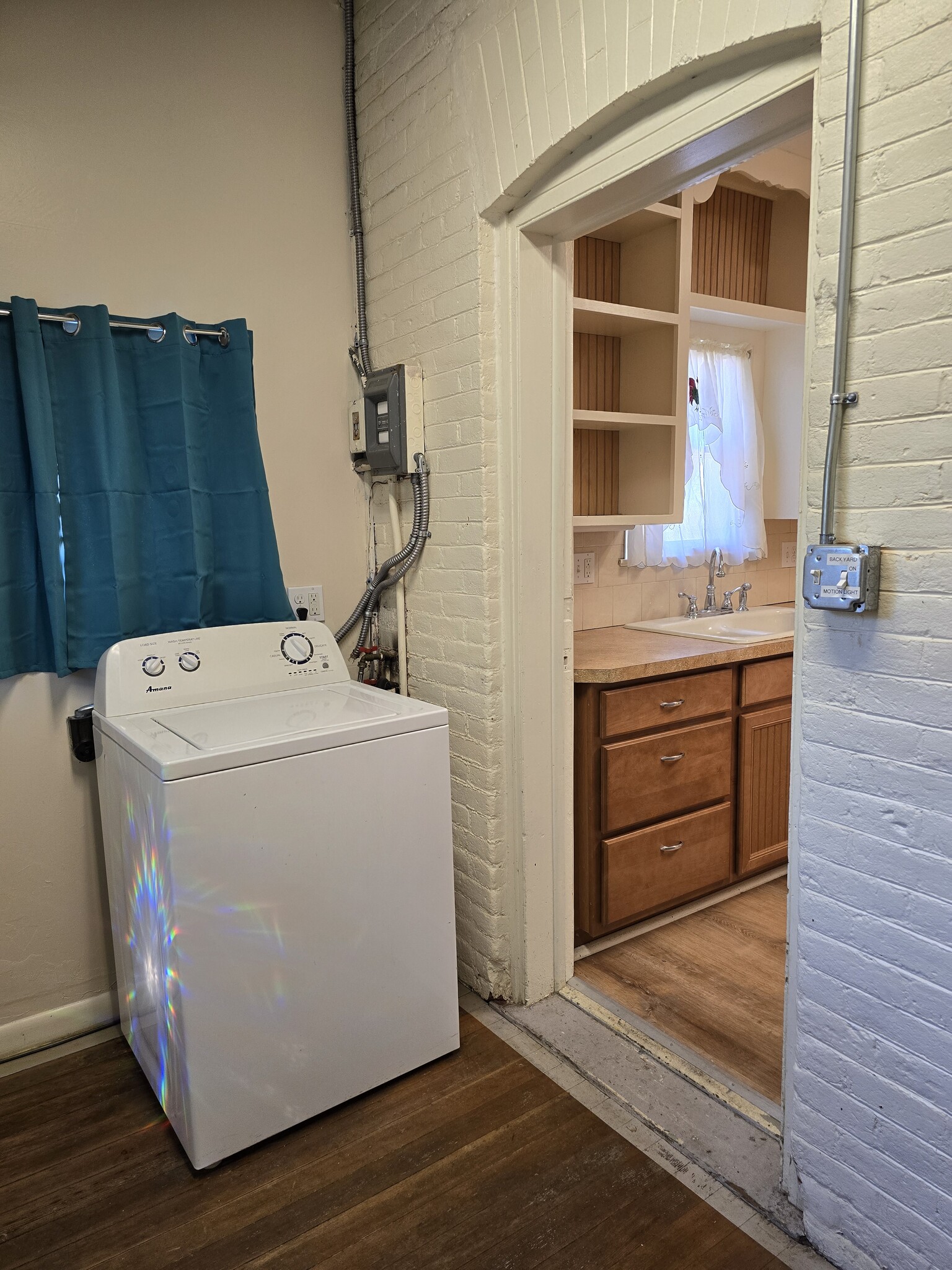 Laundry Area - Washer may be included - 607 Harrison Ave
