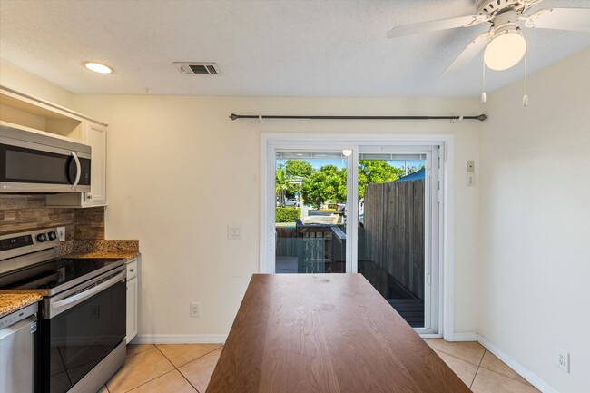 Building Photo - Charming 2-Bedroom home with Front and Rear Balconies