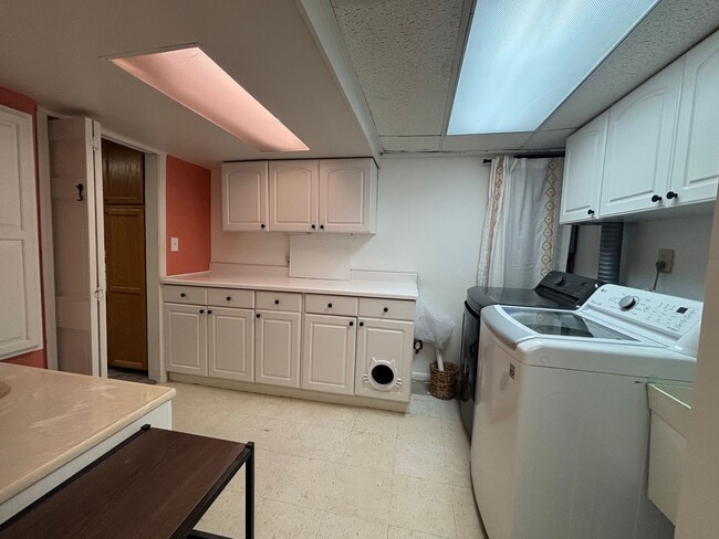 Building Photo - Storybook Bungalow with Beautiful Grounds