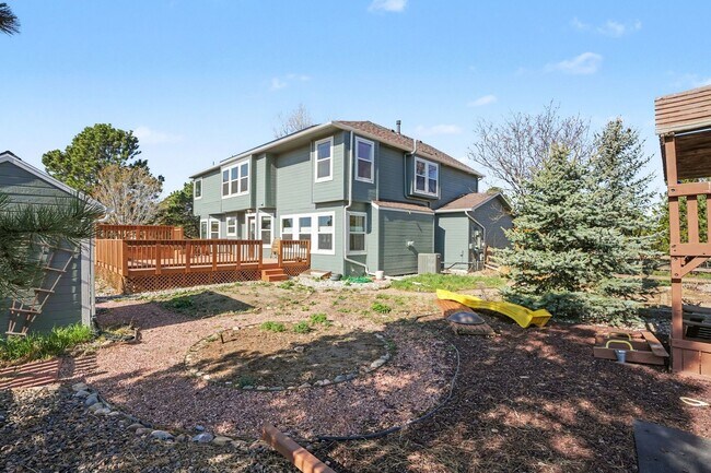 Building Photo - Backs to Open Space | Over 4,000 Sq Ft | Updated Kitchen + Solar