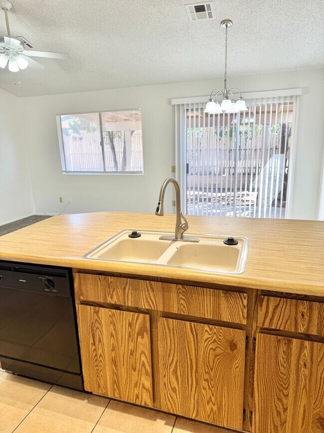 Building Photo - 2 Bedroom/2 Bath Home! Has Backyard, One Car Garage, NO HOA!