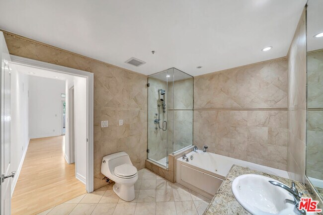 Building Photo - 4477 Woodman Ave