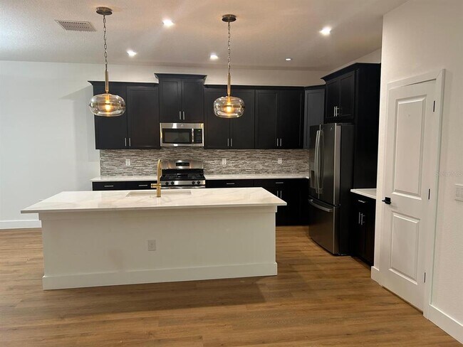 Building Photo - 7591 Purple Finch St