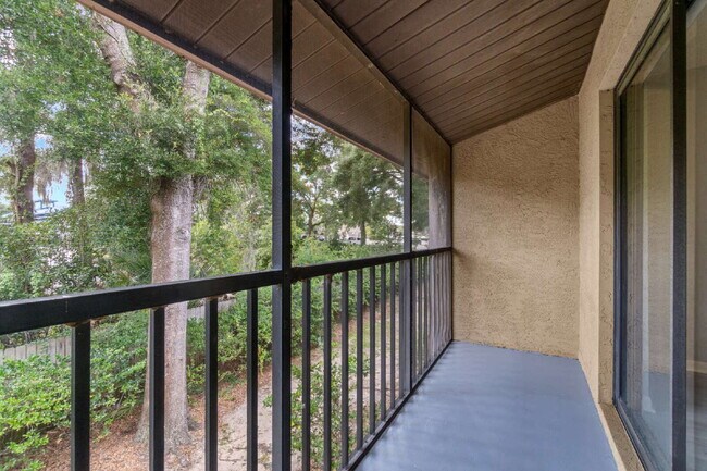 Building Photo - Freshly Updated 2BR Condo with Private Balcony, Community Pool, & In-Unit Laundry