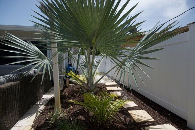 Building Photo - Step Into Sunshine: Modern Charm Meets Coa...