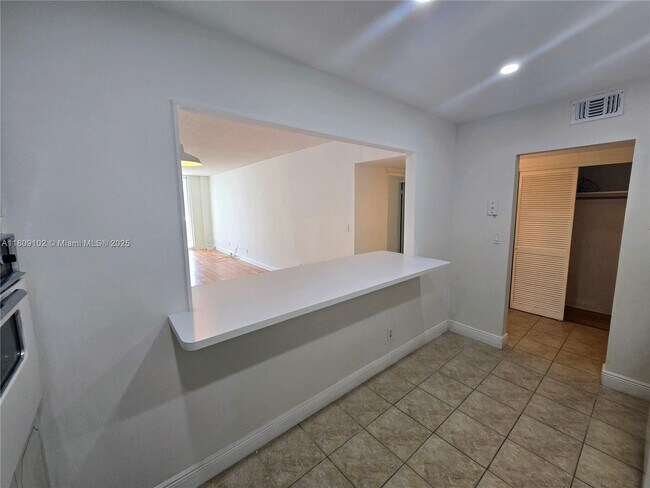 Building Photo - 19380 Collins Ave