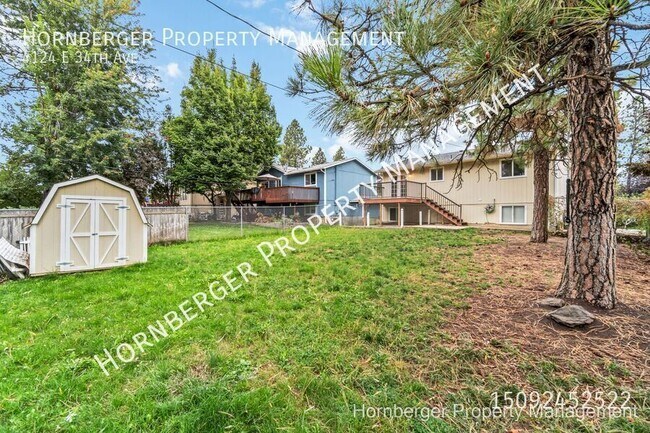 Building Photo - 4124 E 34th Ave