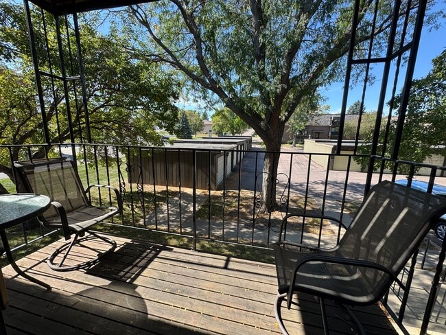 Building Photo - 2BR Condo Near Empire Mall with Garage, Pool & Easy Interstate Access!