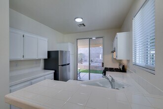 Building Photo - SUMMERLIN BEAUTY*UPGRADED*COMMUNITY POOL*3 BEDROOMS*STAINLESS STEEL APPLIANCES*