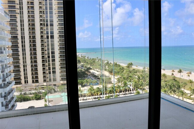 Building Photo - 9801 Collins Ave