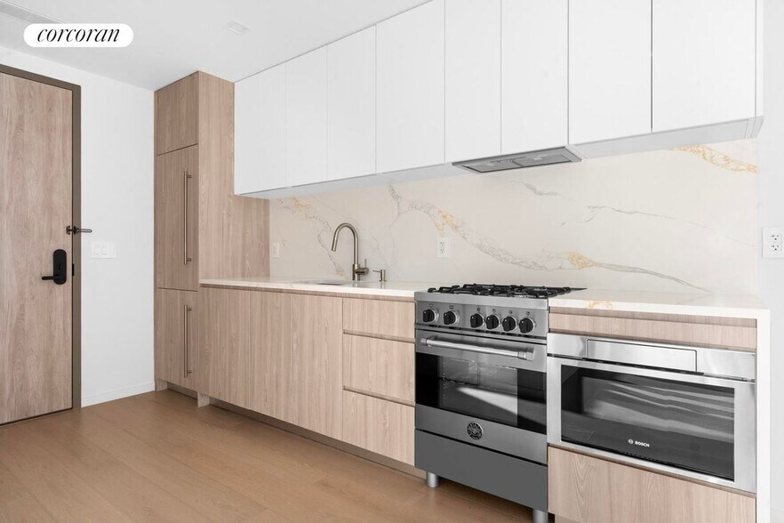 Building Photo - 11-36 45th Road 408A