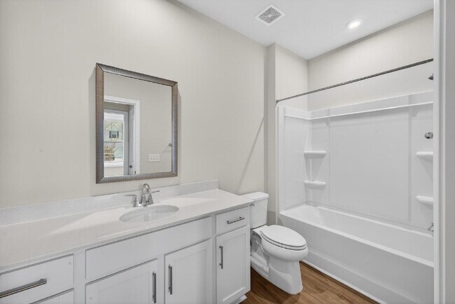 Building Photo - Like-New Harlem Home!