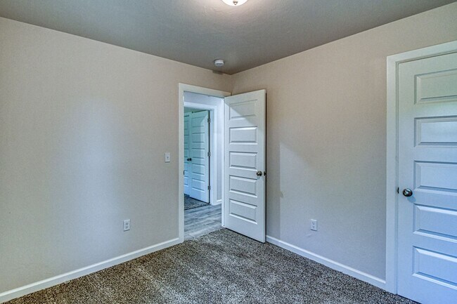 Building Photo - Brand New Construction!  Lawn care included!