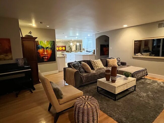 Building Photo - Rare prime waterfront home right on the San Mateo Lagoon, available August 15th!