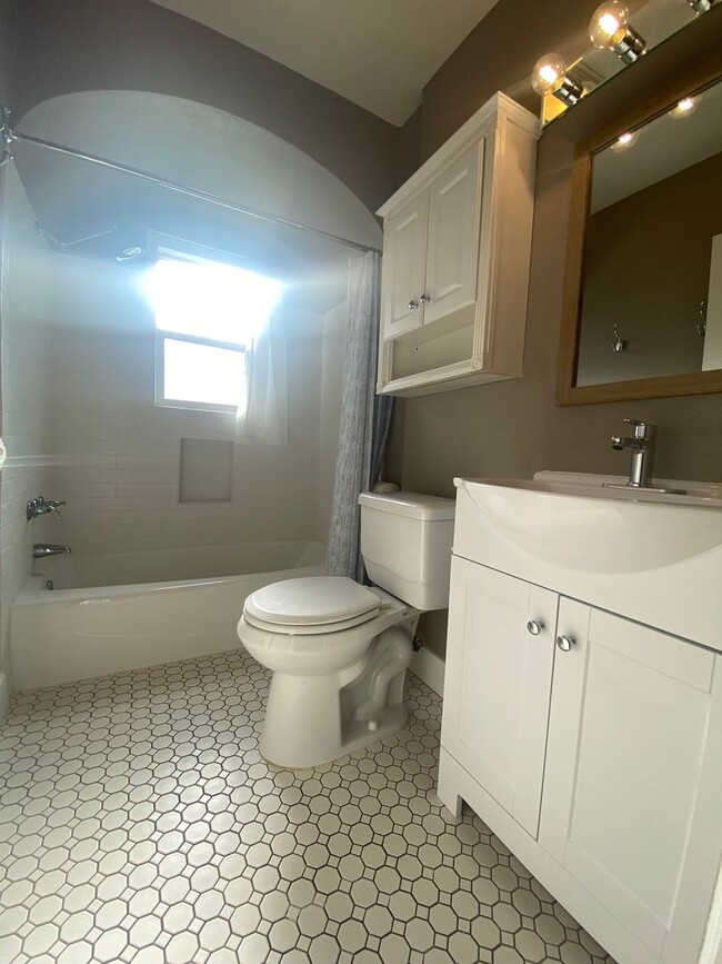 Building Photo - Perry District Gem – Move-In Ready 3 plus Bed / 2 Bath Brick Home with Finished Basement & 2-Car ...