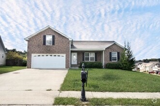 Building Photo - Pet Friendly Three Bedroom with Bonus!