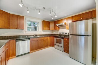 Building Photo - Amazing 4-Bedroom Daylight Basement in Wel...
