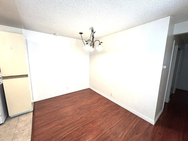 Building Photo - 2 Bedroom, 2 Bath Upstairs Condo with Private Balcony & 2-Car Garage, Gated Community, Water/Tras...