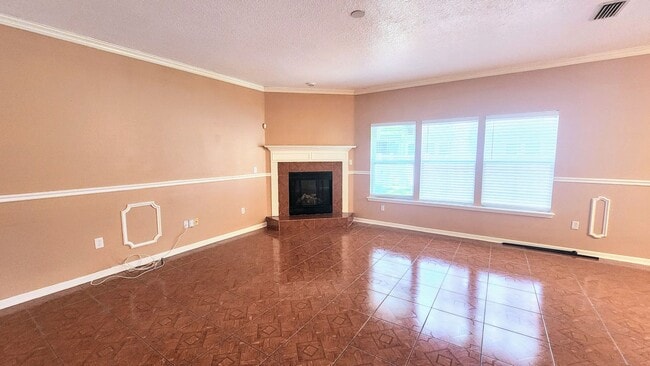 Building Photo - Spacious 4BR w/ Fenced Yard + Covered Lanai + 2 Car Garage  in Orange Park!