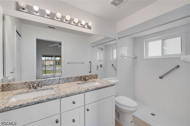 Building Photo - 16840 Sanibel Sunset Ct