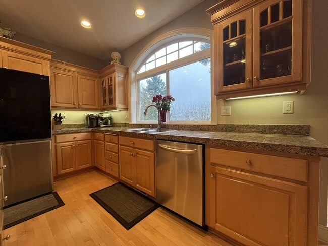 Building Photo - Executive-Style Northwest Heights Home with Forest Views and Refined Architectural Details