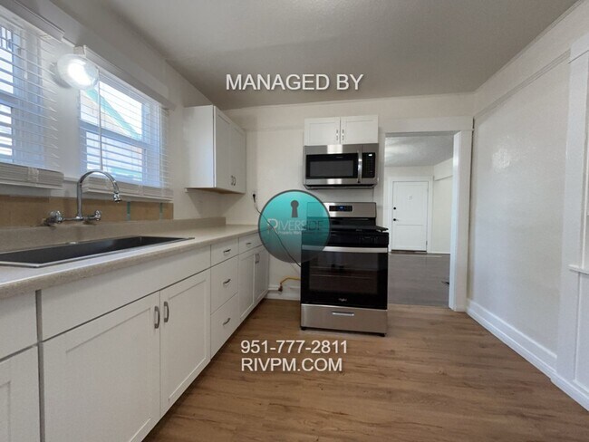 Building Photo - WELCOME TO YOUR NEW HOME IN THE WOOD STREE...