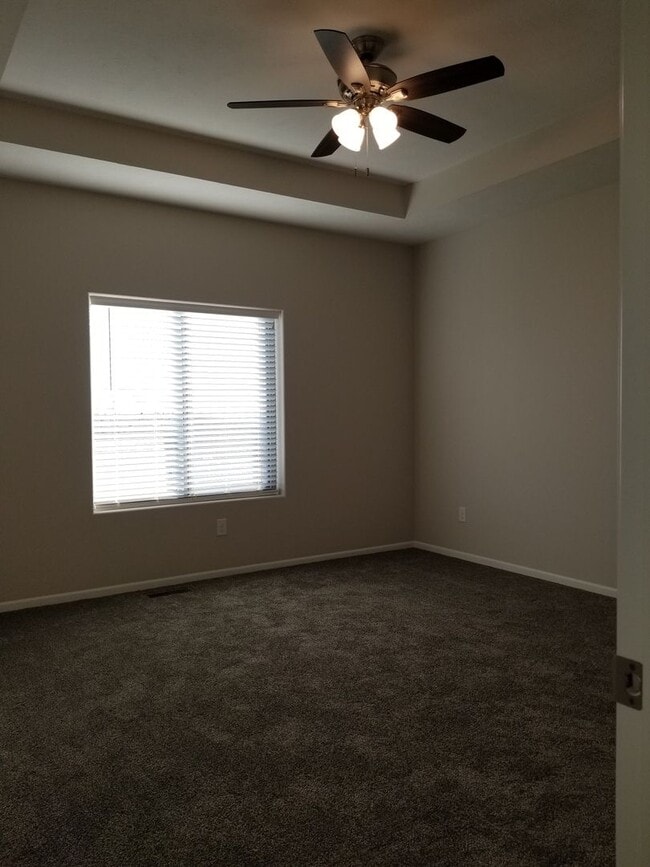 Building Photo - Daylight ranch townhome with 2 stall garage.  Private driveway and covered deck. high end finishe...