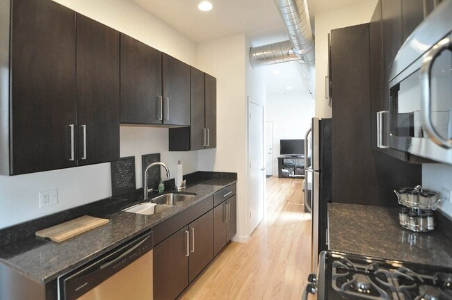 Building Photo - UK Village Brand New Large 1 Bedroom w/Central Heat & A/C, In-Unit Laundry. Free Internet