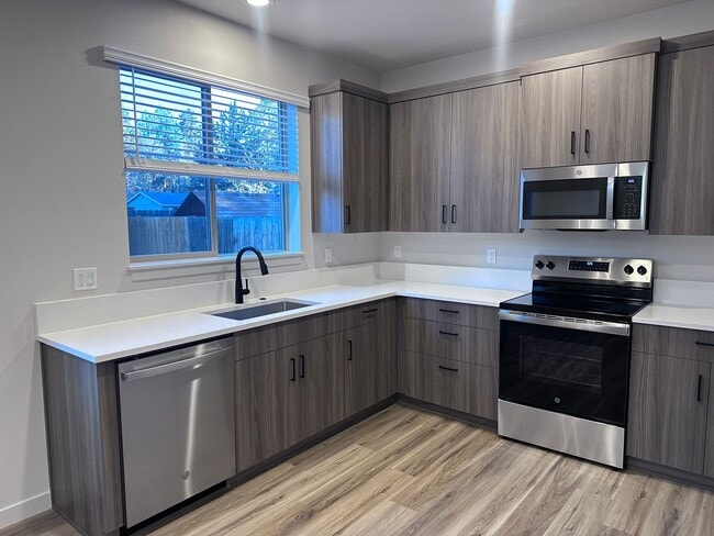 Building Photo - NEW 3 Bedroom near Vince Genna Stadium - Available 4/15