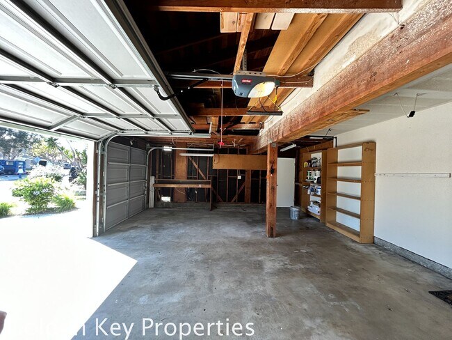 Building Photo - Welcome to this stunning 4-bedroom, 2.5-ba...