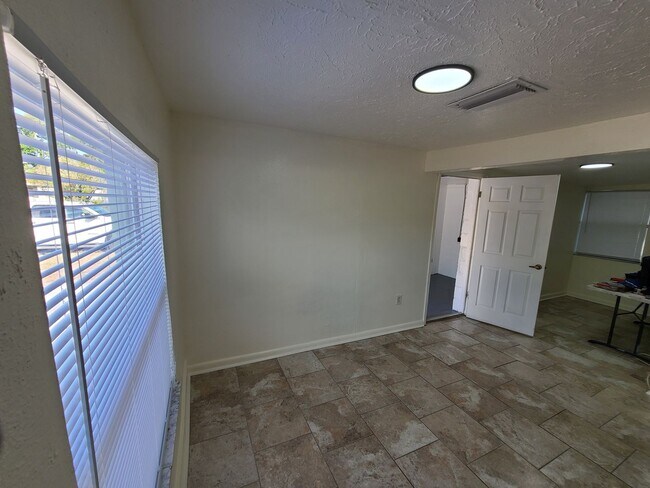 Building Photo - Stunning Corner-Lot Rental: 4BR/2BA with Courtyard
