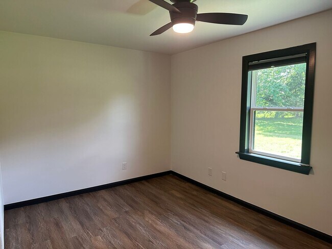 Building Photo - Welcome to country living with a fresh, modern twist.