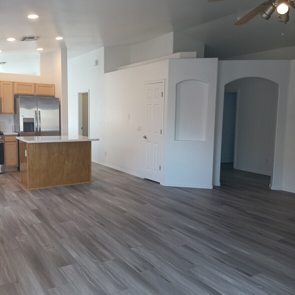 Family room looking back towards kitchen - 2411 E Stone Stable Dr