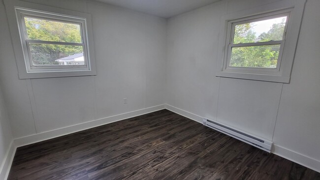 Building Photo - Two Bedroom duplex Available for Rent: One...