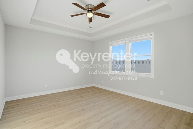 Building Photo - Located in Westfield, IN, this attractive 3-bedroom, 2.5-bath home sits on a corner lot within an...