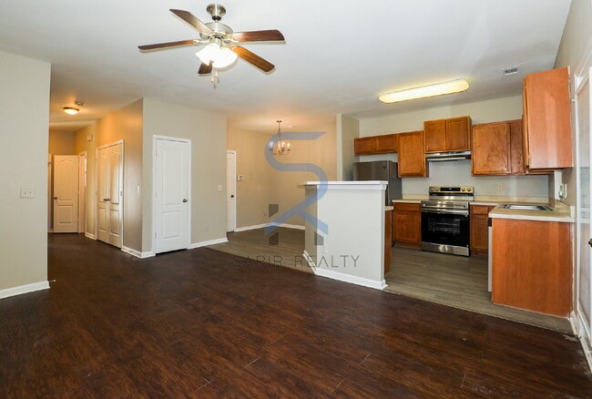 Building Photo - Move in before January 31st and choose your reward: a $250 Amazon Gift Card or a 55" Smart TV!